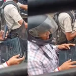 Red Light Workplace: ट्रैफिक सिग्नल पर बाइक पर बैठे-बैठे खोल लिया लैपटॉप, वायरल वीडियो ने उठाये वर्क कल्चर पर सवाल