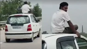 Faridabad News: केजीपी एक्सप्रेसवे पर कार की छत पर बैठकर सफर करना पड़ा महंगा, पुलिस ने काटा 14 हजार का चालान