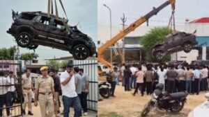 Rajasthan News :झुंझुनूं में कारोबारी की मौत पर अनोखा प्रदर्शन, क्रेन से लटकाकर शोरूम पहुंचाई स्कॉर्पियो