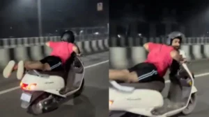 Scooter Stunt Viral: दिल्ली में चलती स्कूटी पर लेटकर 'सुपरमैन' बना युवक, वायरल वीडियो देख एक्शन में आई दिल्ली पुलिस